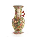 A 19th century Chinese clobbered two-handled vase decorated with figures and flowers with