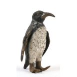 A cold painted Vienna bronze miniature figure of an Emperor penguin, 6cms (2.25ins) high.