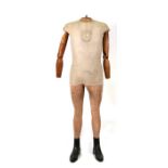 A Pilman's of Paris, mannequin dummy with composite legs, fabric covered fibreboard body and