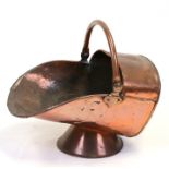 A Victorian copper coal scuttle.