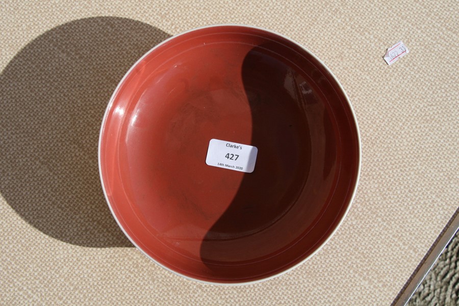 A Chinese red monochrome glaze shallow dish with blue seal mark to the underside, 19cms (7.5ins) - Image 4 of 14