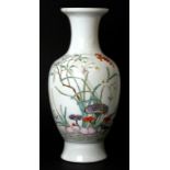 A Chinese famille rose Republic style vase decorated with flowering foliage, red seal mark to