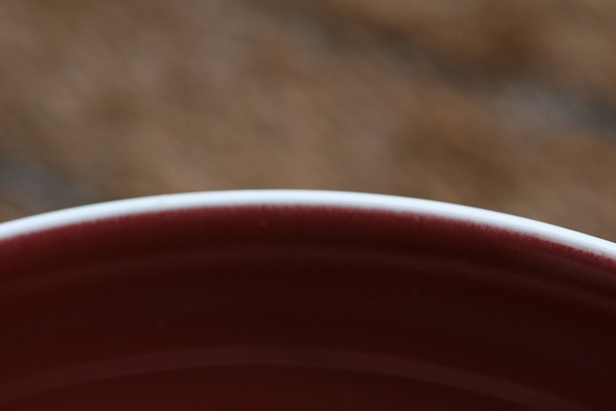 A Chinese red monochrome glaze shallow dish with blue seal mark to the underside, 19cms (7.5ins) - Image 10 of 14