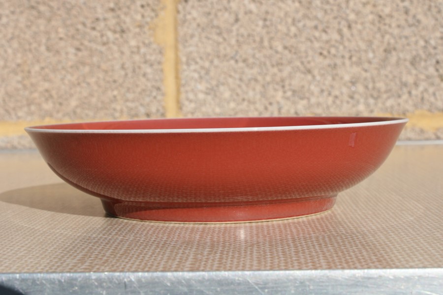 A Chinese red monochrome glaze shallow dish with blue seal mark to the underside, 19cms (7.5ins) - Image 6 of 14