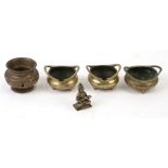 A group of Chinese miniature censers; together with a brass temple figure.