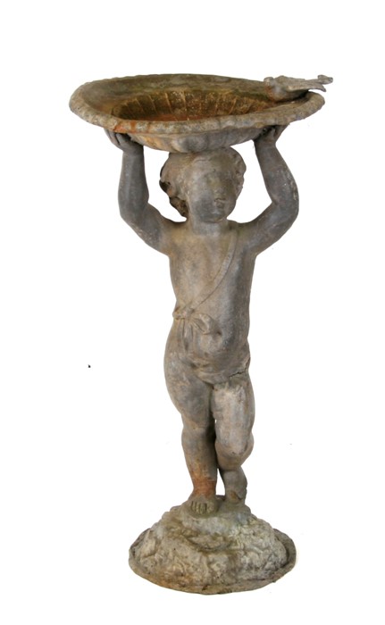 A lead birdbath in the form of a cherub, 70cms (27.5ins) high.