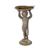 A lead birdbath in the form of a cherub, 70cms (27.5ins) high.