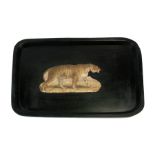 An ebonised rectangular papiermache tray decorated with a tiger, 67cm (27ins) wide.