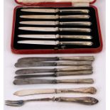 A cased set of silver handled tea knives together with loose silver handled knives