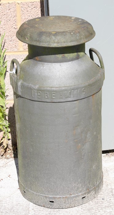 A Dried Milk Products Ltd of Beaminster milk churn. 70cms high including lid