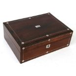 A 19th century rosewood sewing box with pewter and mother of pearl inlay, 30cms (12ins) wide.