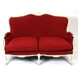 A two seater sofa, with white painted and carved show wood, 135cm (53ins) wide