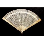 A late 19th / early 20th century Chinese export ivory fan, 9cms (7.5ins) long.