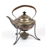 An Arts & Crafts period plated spirit kettle on stand; together with a silver plated wine jug (2).