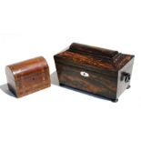 An early 19th century coromandel sarcophagus tea caddy, the interior with two tea boxes and recess