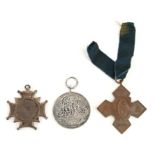 Two late 19th century Army Temperance Association medals together with an early 20th century medal
