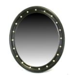An Irish style oval wall mirror, 59cm (23ins) wide