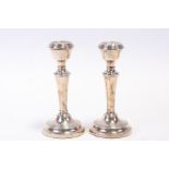 A pair of silver candle sticks, Birmingham 1969, 15cm (6ins) high