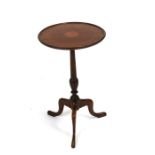 An inlaid mahogany wine table on turned column and tripod base.