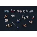 A quantity of Swarovski jewellery to include pins, butterfly brooch and a boxed necklace.