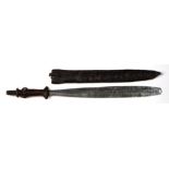 A Congolese Yaka long knife having a shaped leather hilt with wire cage to the centre and a flat