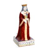 An Arts & Crafts pottery figure of a queen holding a purple flower, possibly early Poole Pottery,