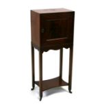 A 19th century figured mahogany collectors cabinet with sectioned interior, standing on square