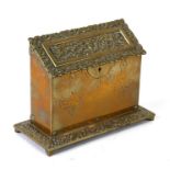 A Victorian brass desk top stationary box with sectioned interior and engraved decoration. 22cm (8.