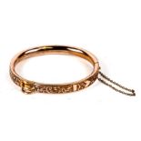 A Victorian rolled gold buckle bangle