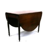 A 19th century walnut oval gateleg table, 107cms (42ins) wide.