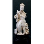 A 19th century Chinese ivory carving in the form of Guanyin, 9cm (3.5ins) high. Condition Report The