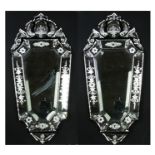 A pair of Venetian style etched glass wall mirrors, 77cms (30.25ins) high.