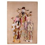 A Chinese silk embroidered picture panel depicting three Immortals, 65cm by 91cm (25.5ins by 36ins)