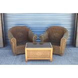 A pair of conservatory chairs; together with a matching glass topped coffee table (3).Condition
