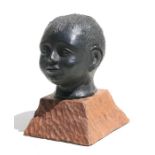 Emma Murdoch (modern British) a bronzed terracotta bust of a child, mounted on an oak plinth, signed