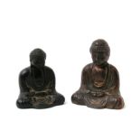 Two miniature metal Buddha's, largest 6cm (2.25ins) high