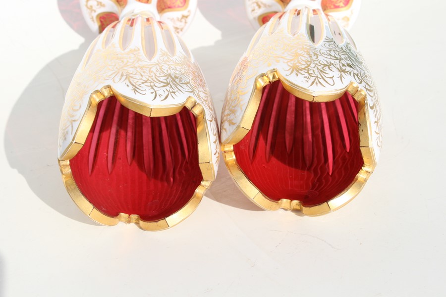 A fine pair of 19th century Bohemian cranberry glass overlaid vases with gilt decoration, 31cms ( - Image 2 of 9