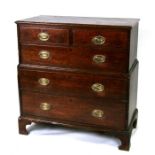 A late 18th/early 19th century oak chest on chest, with 2 short and 3 graduated long drawers