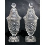 A pair of 19th century cut glass sweetmeat vases and covers, 25cms (9.75ins) high.Condition