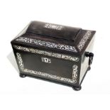 An early 19th century coromandel sarcophagus two-division tea caddy with mother of pearl inlay, on