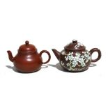 A Chinese Yixing miniature pottery teapot, 7.5cms (3ins) high; together with another similar with