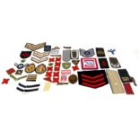 A large quantity of assorted mainly Military cloth badges (approx. 50)