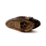 A WW1 hand made bronze trench art Tank paper weight. Overall length 12.5cms (5ins) and weighs