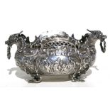 A 19th century continental silver jardiniere decorated with figures and cherubs and dragon head