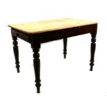 A Victorian painted pine kitchen table with single drawer, on turned legs, 107cm (42ins) wide.