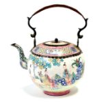 A Chinese enamel teapot of globular form, decorated figures in a garden (AF) 24cm (935ins) high