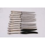 Eleven Danish Art Deco silver handled dinner knives in the manner of Georg Jensen.
