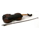 A two-piece backed violin and bow, 60cm (23.5ins) long.