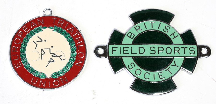A British Field Sports Society chrome and enamel car badge by Butler 9.5cms (3.75ins) by 7.5cms (