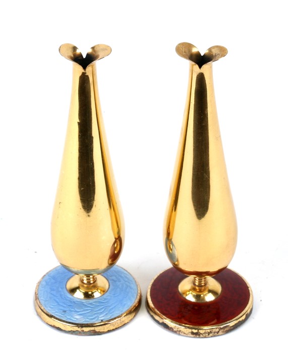 A pair of Danish silver gilt and enamel vases, 16cms (6.25ins) high.